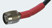 TNC RF line connector with adhesive lined heat shrink tubing sealing the termination